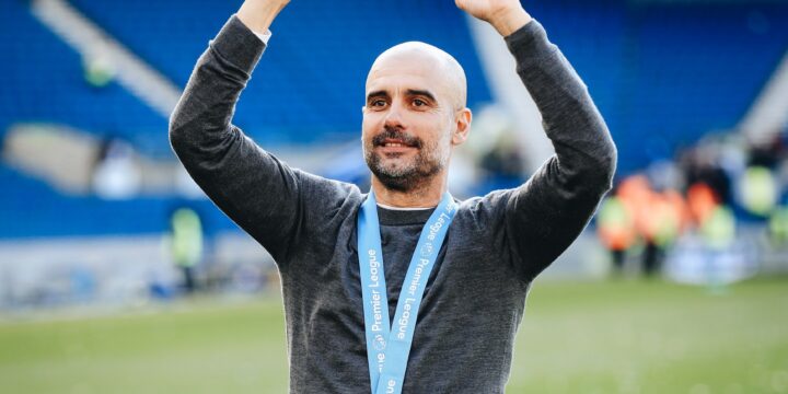 Pep Guardiola celebrating a Premier League title